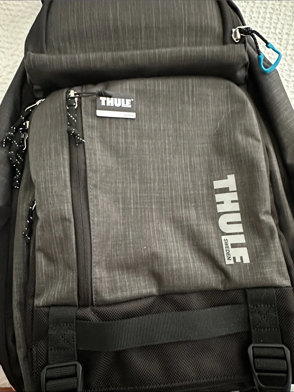 Thule Charcoal Gray Backpack with Teal Accent